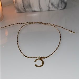 Necklace with a C